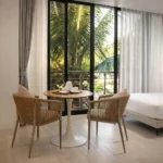 Bright deluxe room at a hotel near SkyRanch Tagaytay with a private balcony