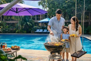 Family enjoying a poolside BBQ at a resort in Silang Cavite