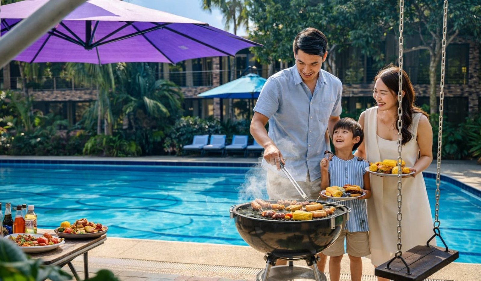 A family bonding by a brick grill station under a wooden pergola in the barbeque area at Wondellea