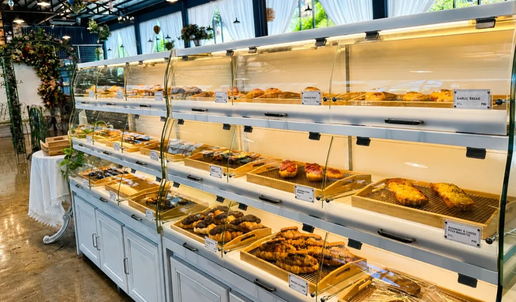 Pastry display filled with baked goods at Wondellea Cafe & Resort, a must-visit cafe in Cavite.