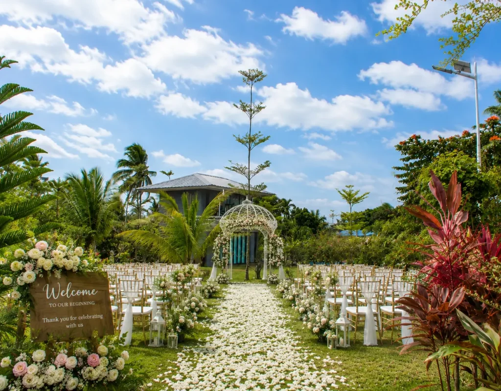 An elegant outdoor floral arrangement and guest seating setup for a beautiful garden wedding reception at Wondellea